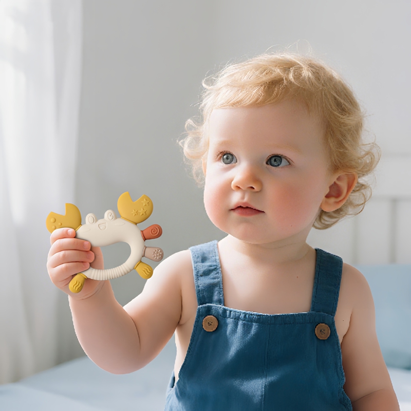 Baby Food Intake - Il giocattolo per granchio multicolore in